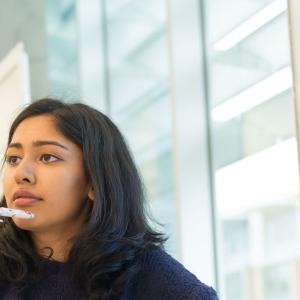 Photo of student in research meeting